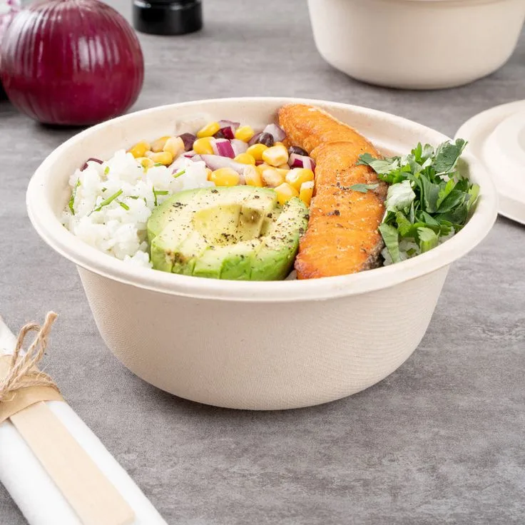 bagasse salad bowl biodegradable Biodegradable bagasse salad bowl made from sugarcane fibers, filled with healthy salad, sustainable food packaging option