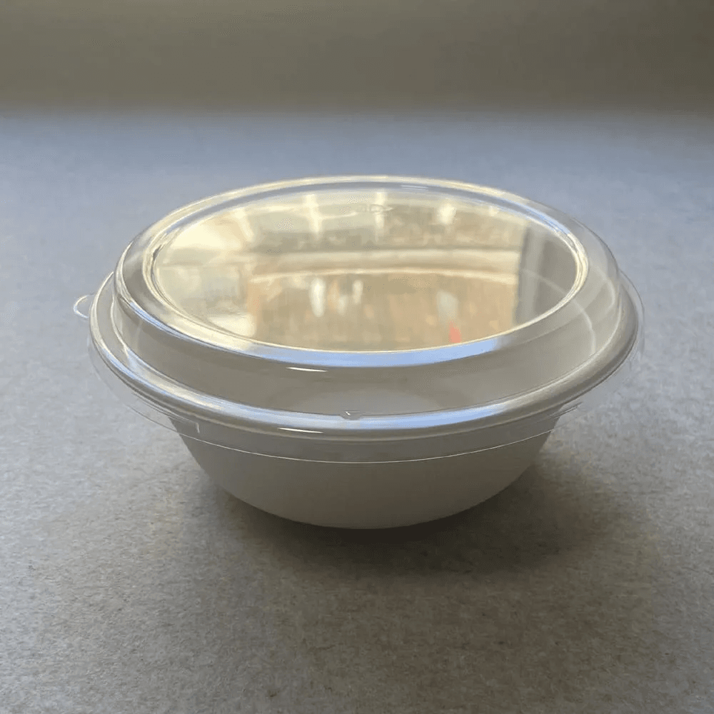 Tigela de Ramen de Bagaço com Tampa Apertada para Entrega à Prova de Fuga Tigela de ramen de bagaço compostável com uma tampa transparente de fecho hermético que demonstra um desempenho à prova de fugas, utilizada por uma cadeia de ramen para reduzir os incidentes de derrame.