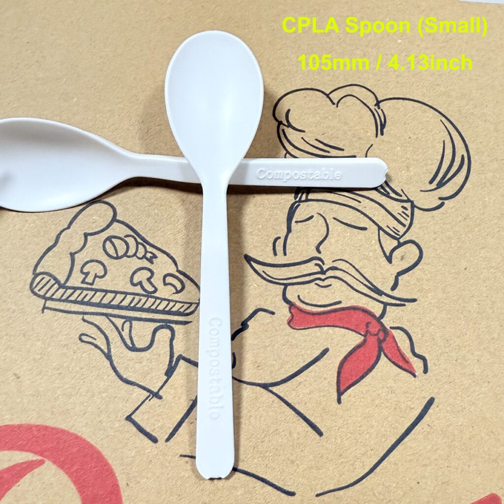 Petite cuillère compostable 105mm CPLA sur fond de boîte à pizza kraft, couverts biodégradables résistants à la chaleur pour desserts et dégustations