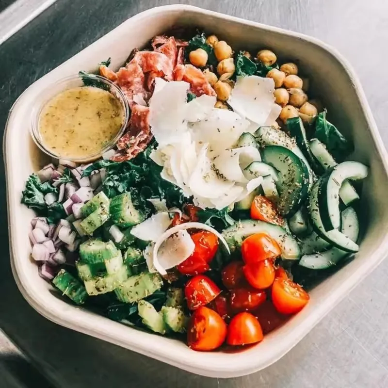 Compostable poke bowls used for salad grain bowls and meal prep packaging