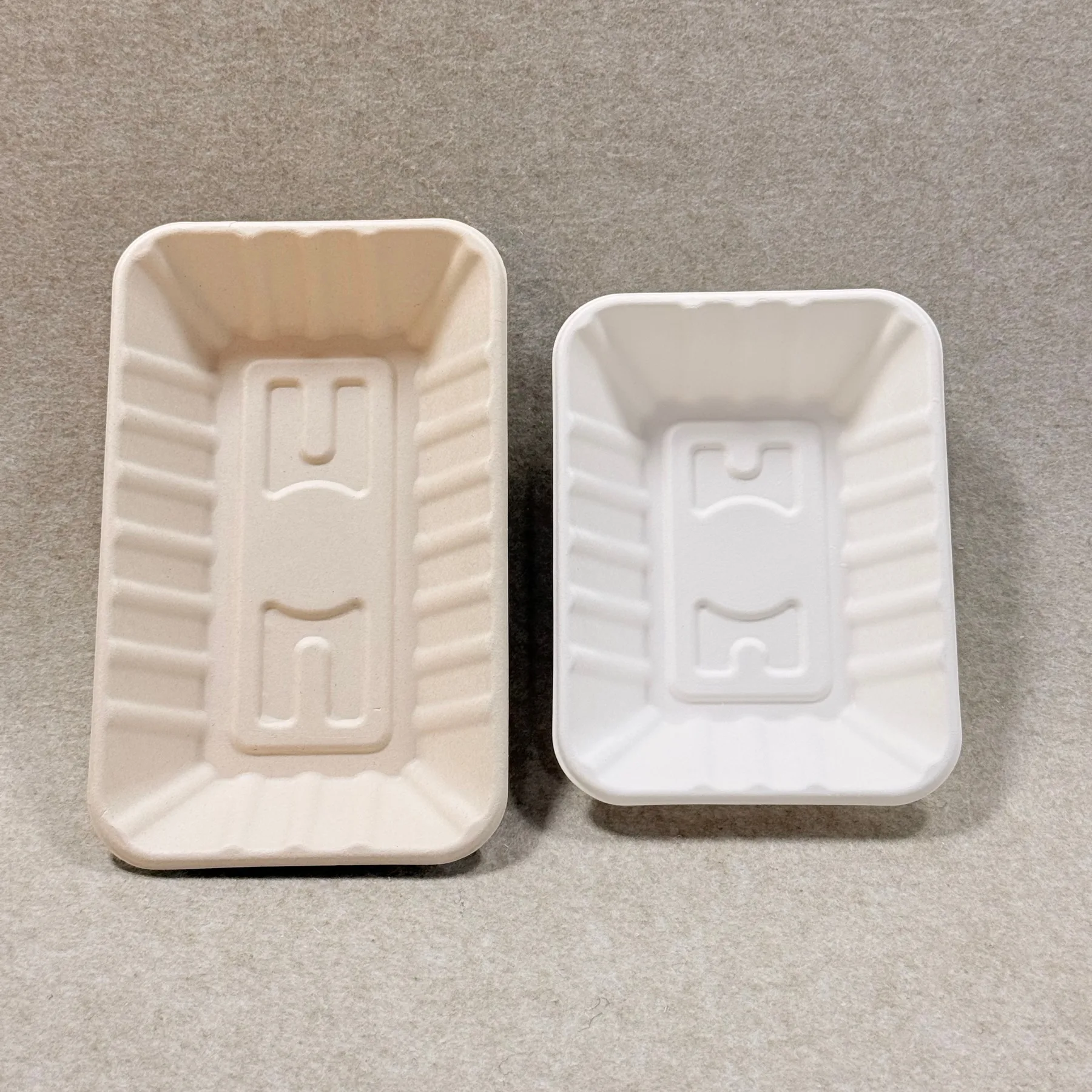 Brown and white bagasse fruit tray comparison molded pulp tray