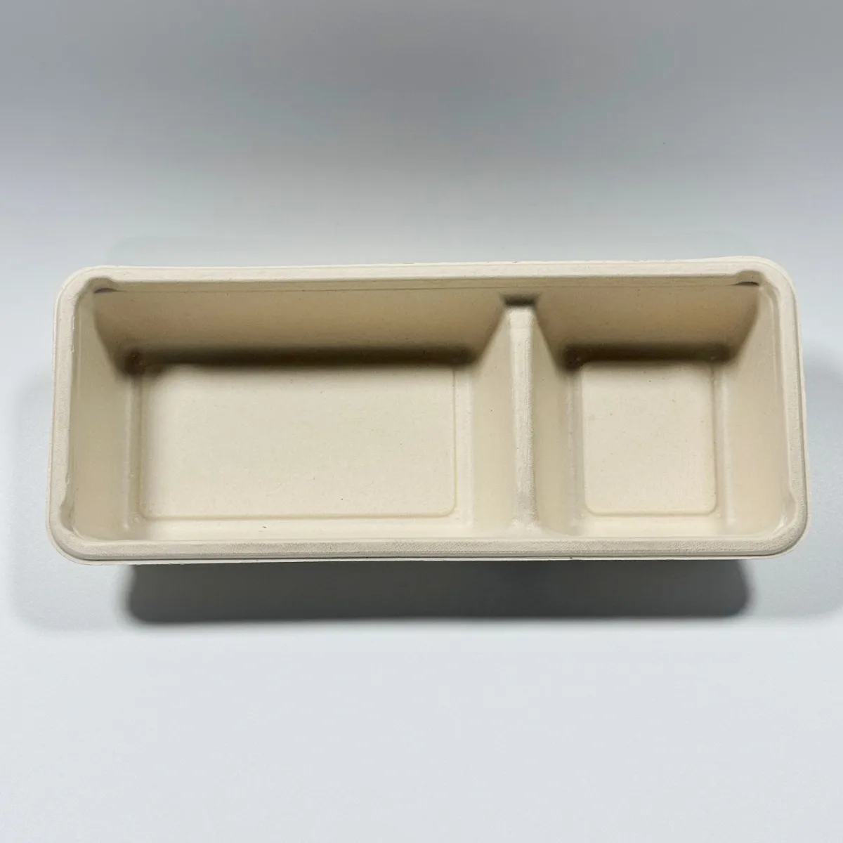 PFAS-free bagasse sushi takeout container with separate compartment for sauce and sides