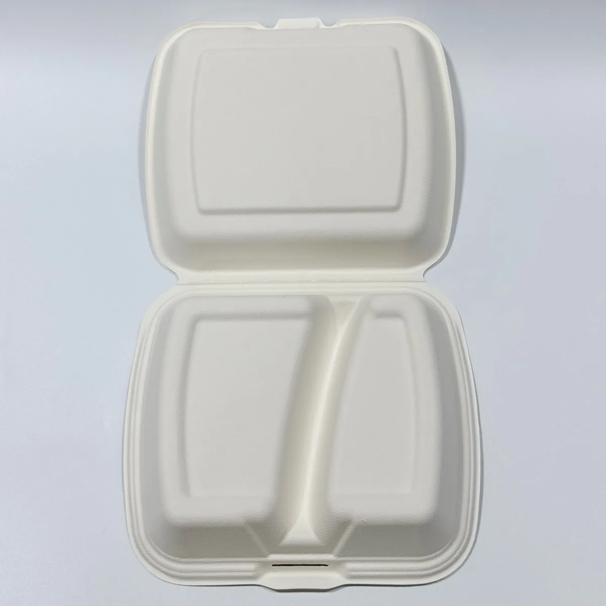Compostable 2-compartment sugarcane clamshell box for takeout food delivery and catering